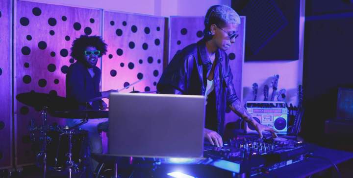 band members performing music with electronics and 2026 03 26 03 58 30 utc